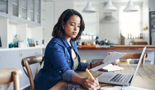 woman-budgeting-with-computer-1200x675