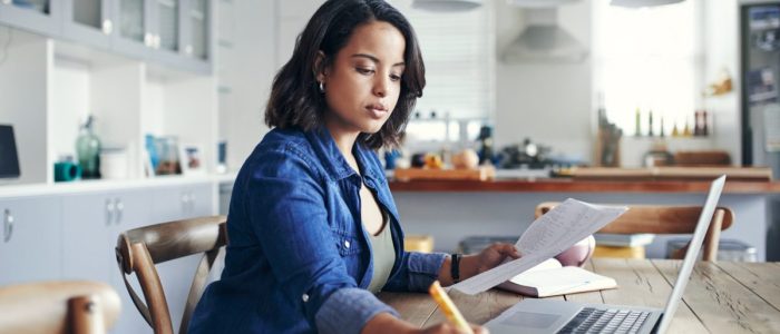 woman-budgeting-with-computer-1200x675